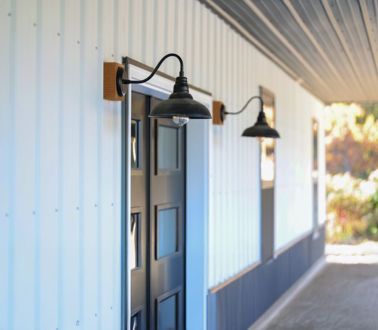 Nice barn wall closeup. Outdoor lights. Ag panel metal.
